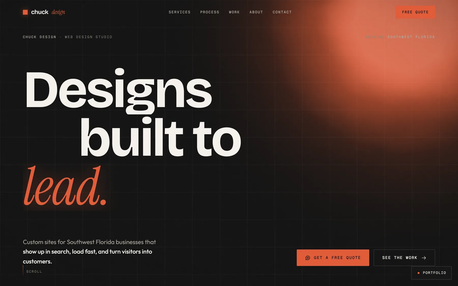 The home page on desktop. One beam of light, everything else dark.
